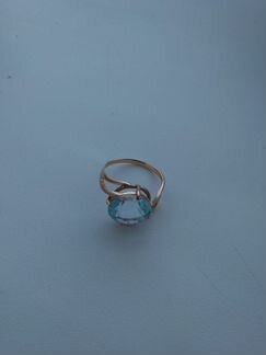 Продам кольцо с голубым топазом