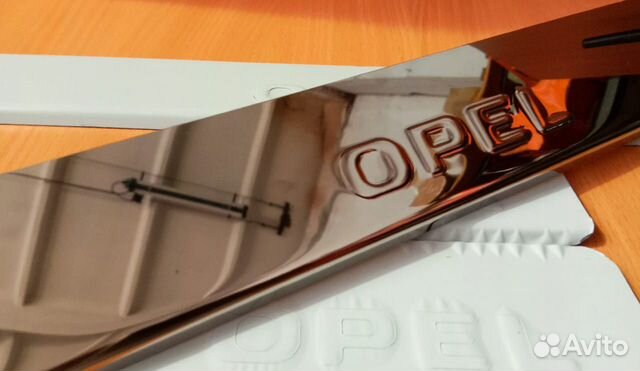 Накладки на пороги Opel Astra 2013 (нержавейка)