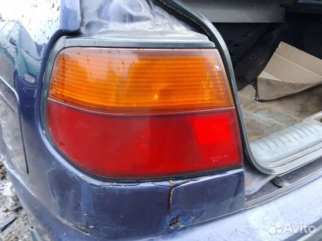 Задний левый фонарь Nissan Almera n15