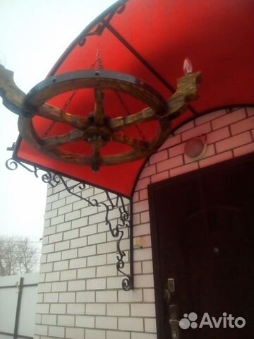 Колесо от телеги люстра