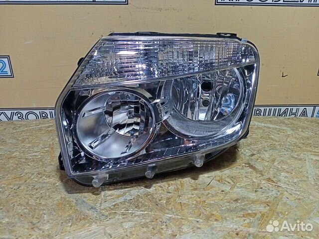 Фара левая Renault Duster (10-15г) хром