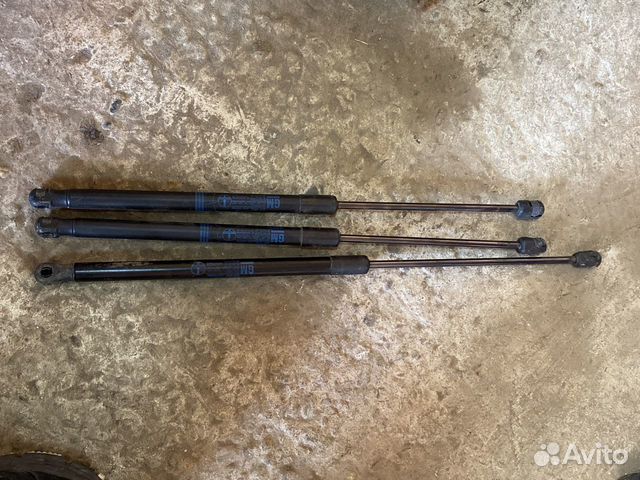 Амортизатор крышки багажника капота Opel Astra H