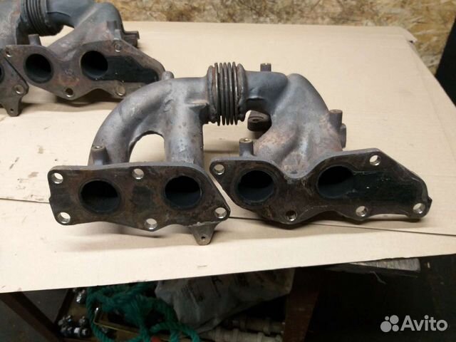 Коллектор выпускной 2.3 турбо Мазда сх7 оригинал