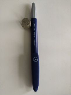 Ручка и значок Лиги Чемпионов