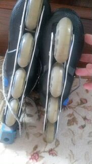 Роликовые коньки